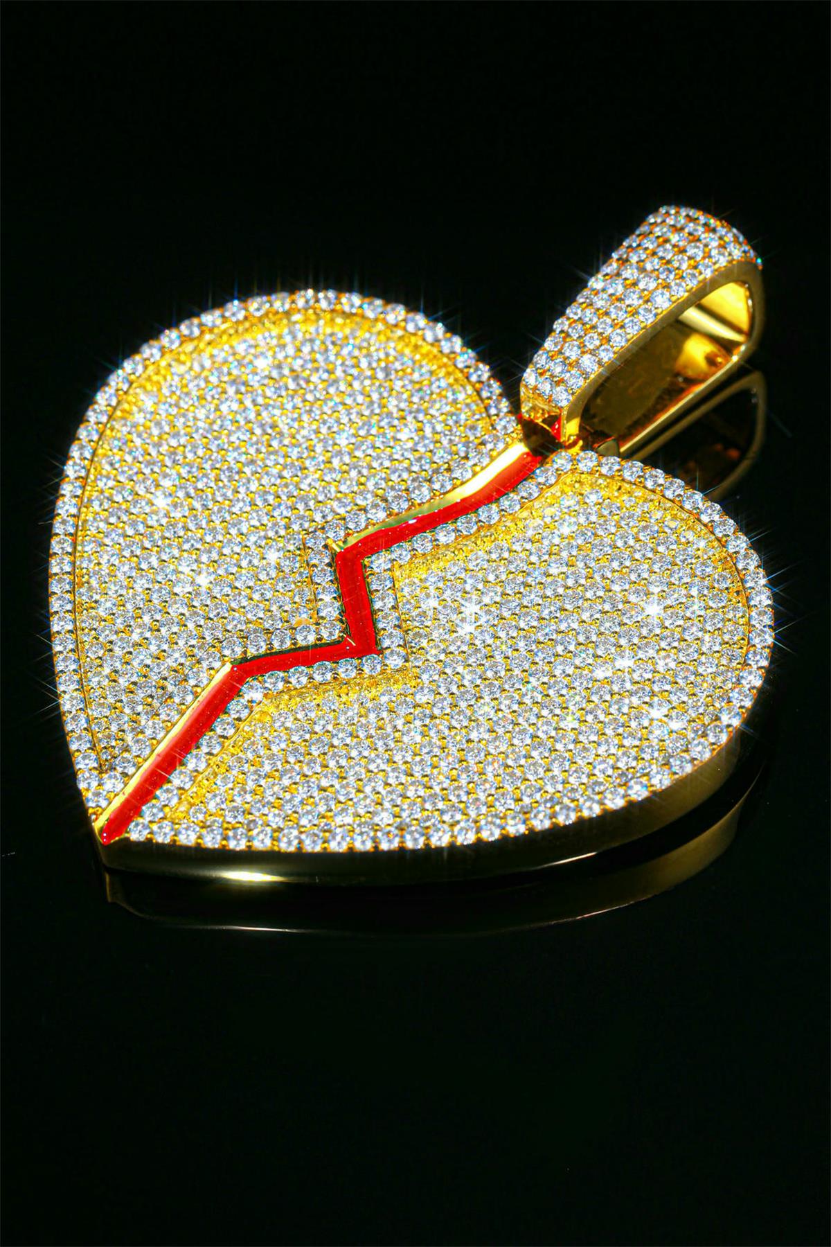 A heart-shaped pendant with a drop of glue, inlaid with moissanite