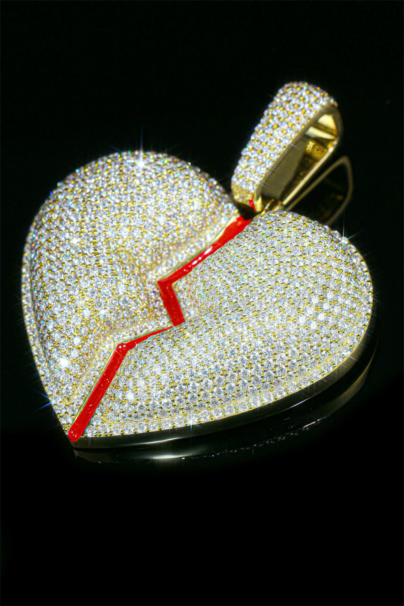 A shattered heart pendant fully inlaid with moissanite