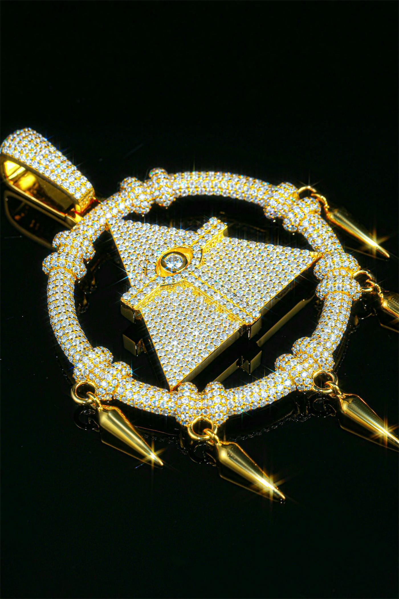 A pendant shaped like the triangular geometric form of the Millennium Puzzle from